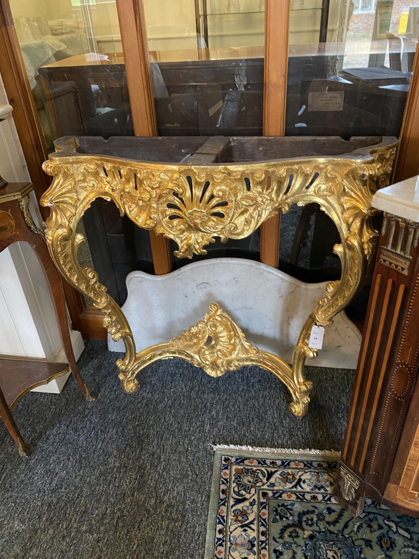 A 19th century Louis XV style giltwood serpentine console table - Image 2 of 8