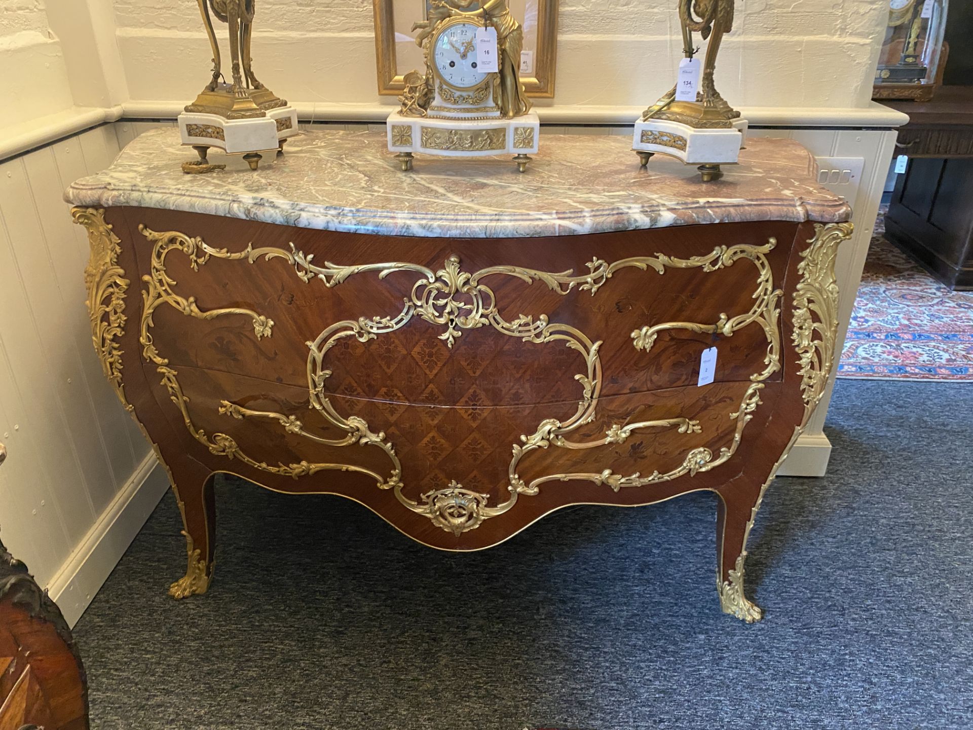 A late 19th century / early 20th century Louis XV style kingwood and marquetry commode retailed by M - Image 2 of 10