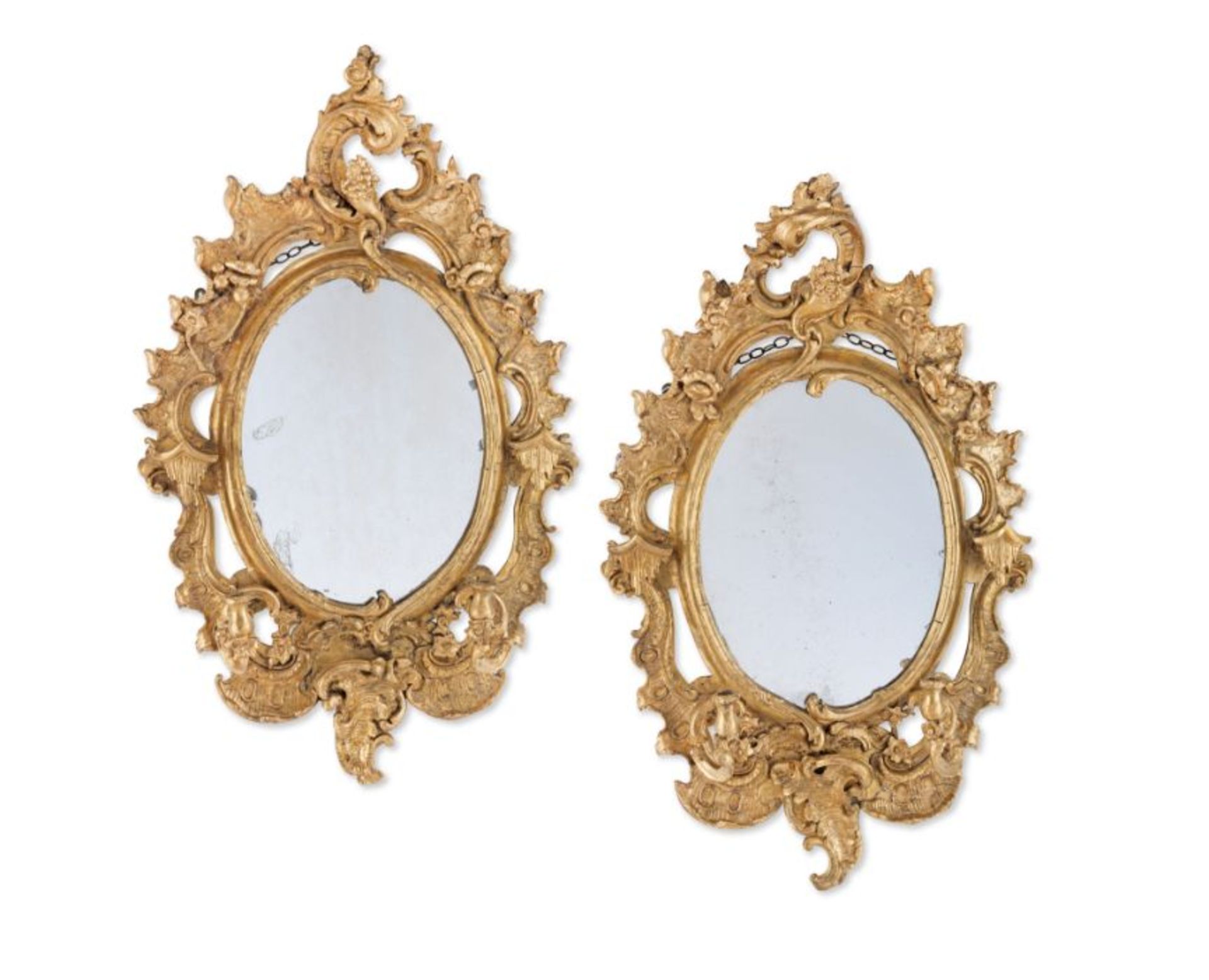 A pair of late 19th / early 20th century carved giltwood and composition girandoles