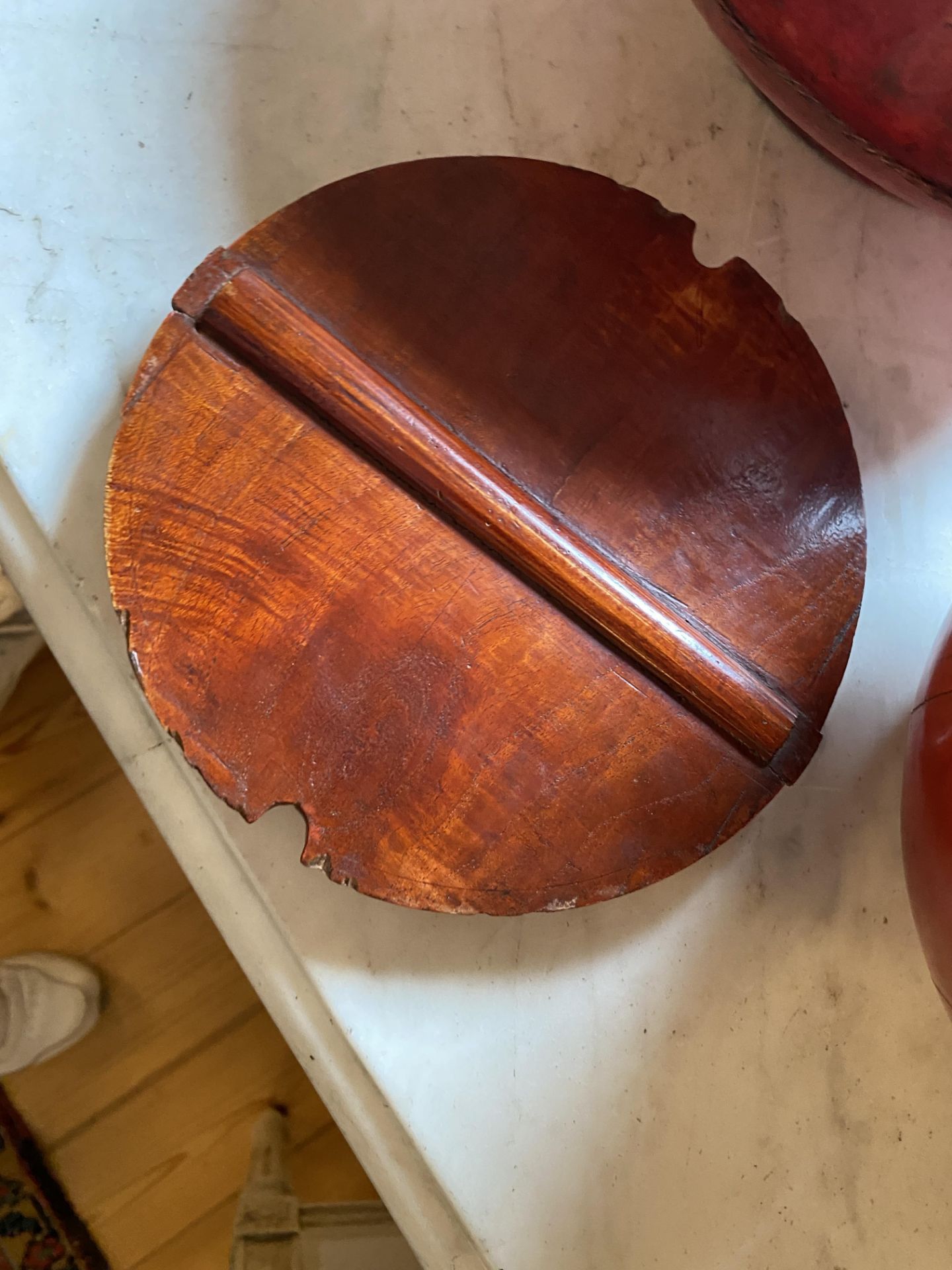 An early 20th century Chinese teak rice measure and three Chinese red lacquered rice carriers - Image 8 of 14