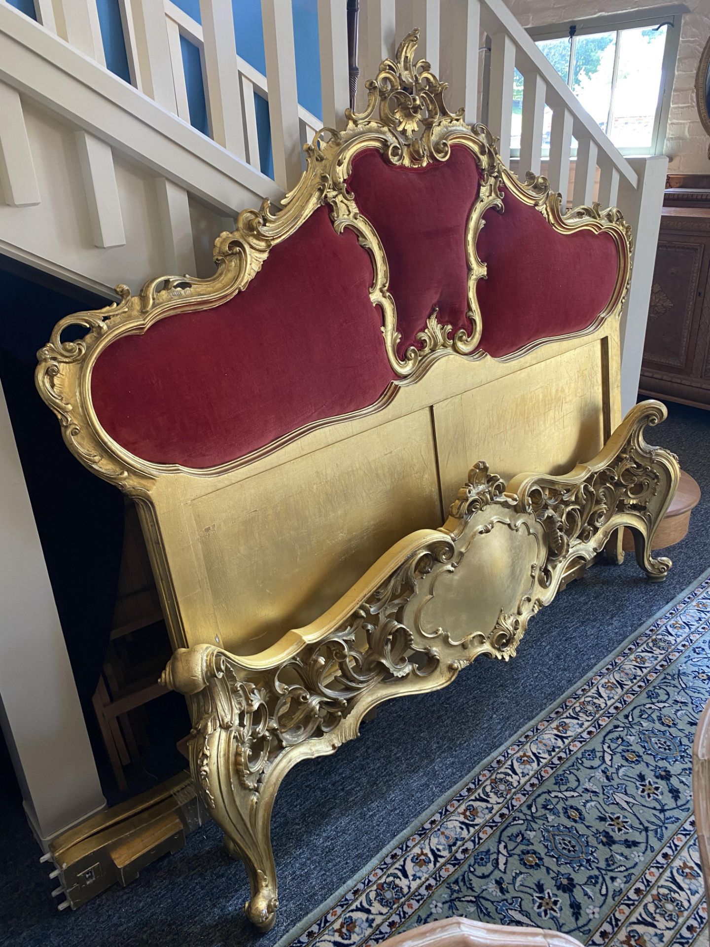 A 19th century and later rococo style carved giltwood bed - Image 4 of 10