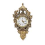 A late 19th century French Louis XVI style gilt bronze cartel clock
