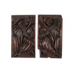 A pair of carved oak panels, Dutch, early 17th century