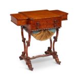 An early Victorian satinwood games/work table in the manner of Gillows