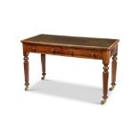 An early Victorian mahogany writing table in the manner of Gillows