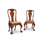 A pair of late 19th / early 20th century George I style figured walnut side chairs