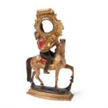A carved watch stand depicting a rider on horseback, Austria, circa 1700