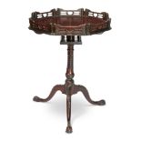 A George III carved mahogany octagonal tripod table