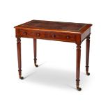 A George IV mahogany writing table by Holland & Sons