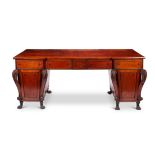 A Regency mahogany and ebony marquetry pedestal sideboard