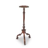 A late Victorian Chippendale style rosewood and mahogany carved torchere