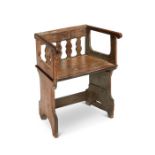 An unusual oak child's armchair, 19th century