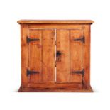 A 19th century pine hanging cupboard
