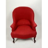 An early 20th century French mahogany red wool upholstered armchair