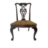 A George II carved mahogany dining chair