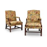 A pair of late 19th century George III style mahogany Gainsborough chairs