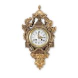 A late 19th century French Louis XVI style gilt bronze cartel clock