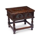 A 17th century and later carved box on stand
