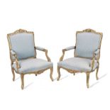 A pair of 20th century Louis XV style giltwood fauteuils / open armchairs