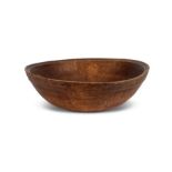 A large 19th century ash turned dairy bowl