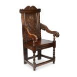 A late 17th century oak and boxwood chequerbanded wainscot chair