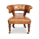 An early Victorian satinwood 'Captain's' library chair