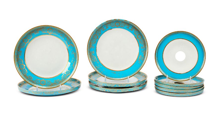 A set of ten early 20th century green, white and gilt porcelain dishes for a surtout-de-table