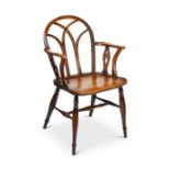 A George IV yew and elm gothic Windsor armchair, Thames Valley