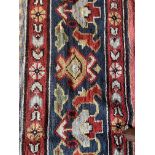 An impressive Arts & Crafts Donegal carpet, circa 1900