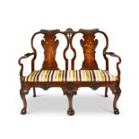 A late 19th century George I style double chair-back walnut carved and marquetry settee