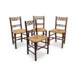A set of four 19th century elm and ash rush seat chairs