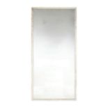 A large early 20th century white painted mirror with original plate