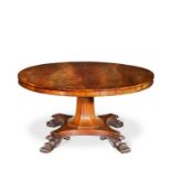 A large Regency mahogany circular dining table