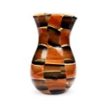 A brown and grey chequered aventurine glass vase of bulbous form in the manner of Fulvio Bianconi