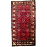 A vintage Baluch carpet