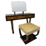 A 1940's walnut and ebonised dressing table and associated stool