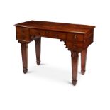 A Regency mahogany carved library table