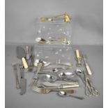 A group of silver plate ware, to include candle snuffer, sugar tongs, spoons, cake slice and other