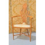 An Edwardian satin wood presentation chair with a shaped marquetry back splat with a presentation