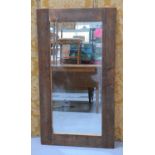 A rough finish plank full length mirror, 75 by 137cm.