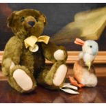 A Steiff Classic Teddy bear with tags, together with a vintage Steiff duck.
