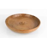 A Robert Thompson 'Mouseman' fruit bowl, the adzed surface, carved with trademark mouse to the