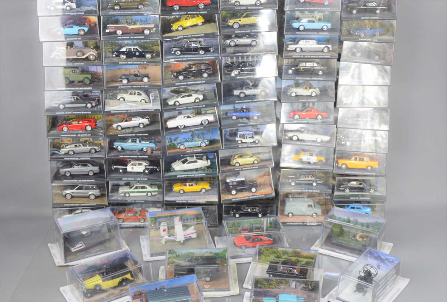 A large collection of James Bond diecast cars and vehicles by GE Fabbri Ltd, 2008.