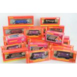 A group of Hornby 00 gauge railway wagons and rolling stock, all in original boxes