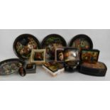 A quantity of Russian black lacquered and painted boxes, depicting figural, architectural,