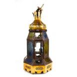 A 19th century lantern of octagonal form, with coloured stained glass panels, and candle holder
