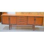 A large Mid-Century G-Plan four drawer teak sideboard214cm by 46cm by 81cm high
