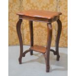 A small rosewood occasional table with shaped top 26cm high