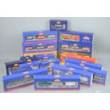 A group of Hornby, Mainline and Bachmann 00 gauge railway carriages, all in original boxes