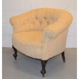 A newly upholstered 19th century button back tub chair, the ball and claw front legs raised on